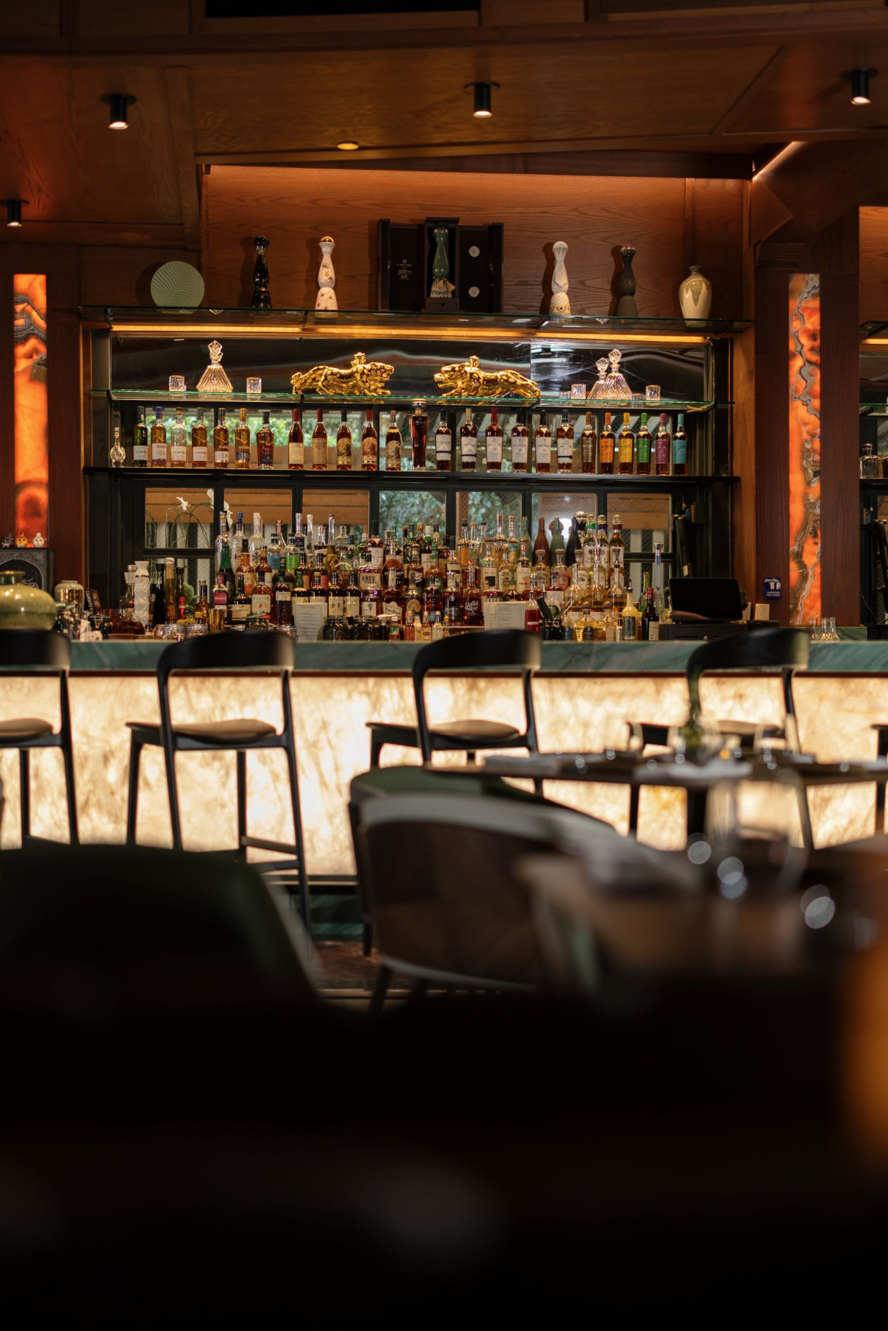 The glowing front face of The Social bar at night